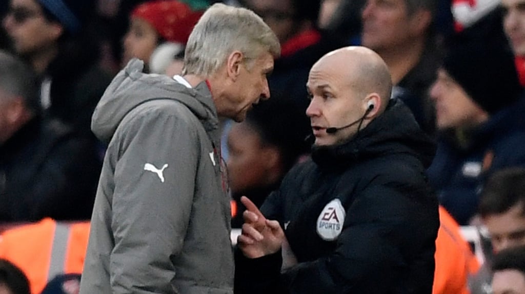 Arsenal manager Arsene Wenger clashes with fourth official Anthony Taylor before being sent to the stands. Photograph: Dylan Martinez/Reuters
