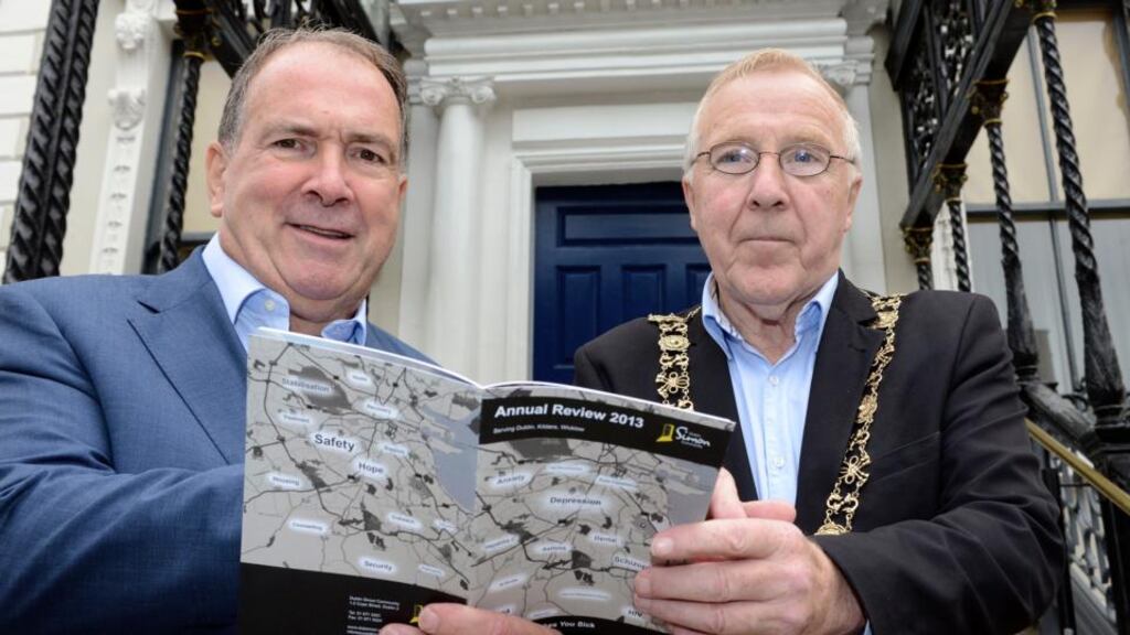 The Dublin Simon Community launched its Annual Review of 2013 at the Mansion house with Christy Burke, Lord Mayor of Dublin, pictured with Sam McGuinness of Simon Community. Photograph: Dave Meehan