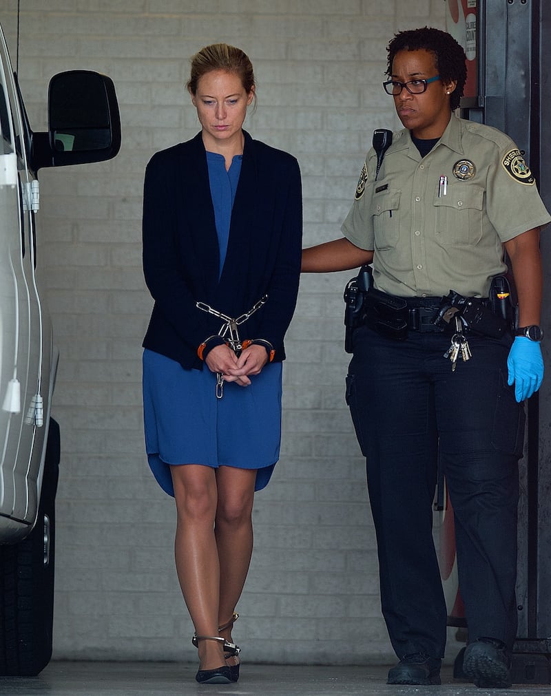 Molly Martens Corbett is led in shackles and handcuffs to a waiting van for transport to prison on Wednesday afternoon. Photograph: Donnie Roberts/The Dispatch