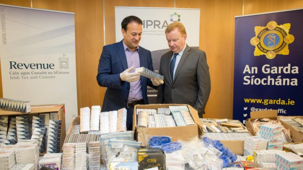 Highlighting the range of illegal medicines seized during Operation Pangea in Ireland were Minister for Health Leo Varadkar and Health Products Regulatory Authority chief executive Pat O’Mahony. Photograph: Naoise Culhane