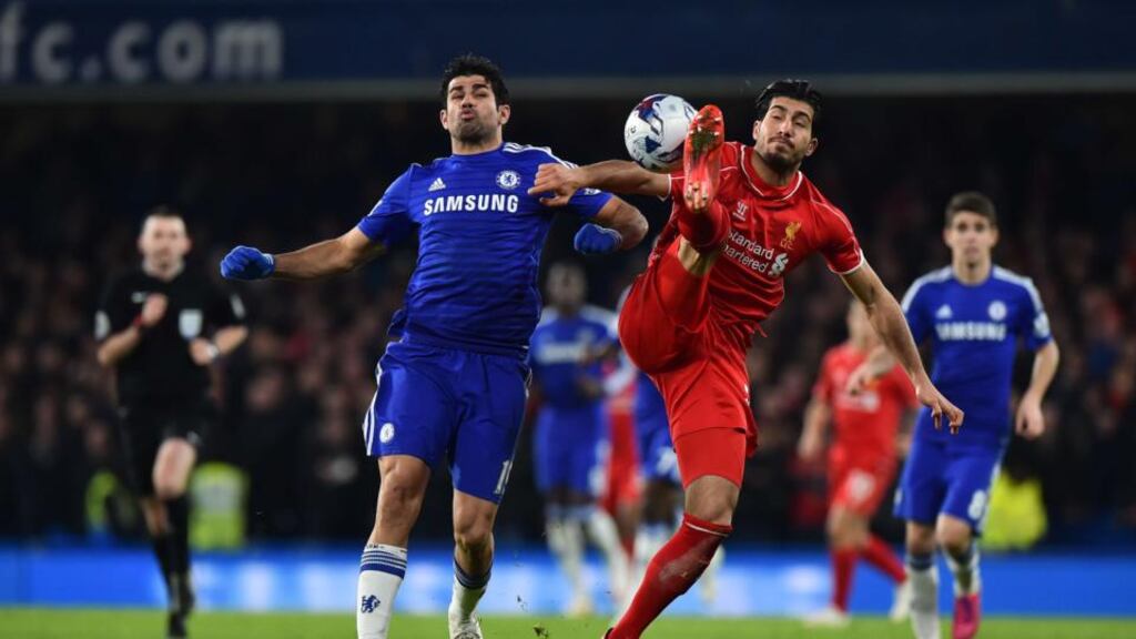 Chelsea’s Brazilian-born Spanish striker Diego Costa pressures Liverpool’s German midfielder Emre Can during the English League Cup semi-final second leg football match between Chelsea and Liverpool at Stamford Bridge . Photograph: Ben Stansall/AFP