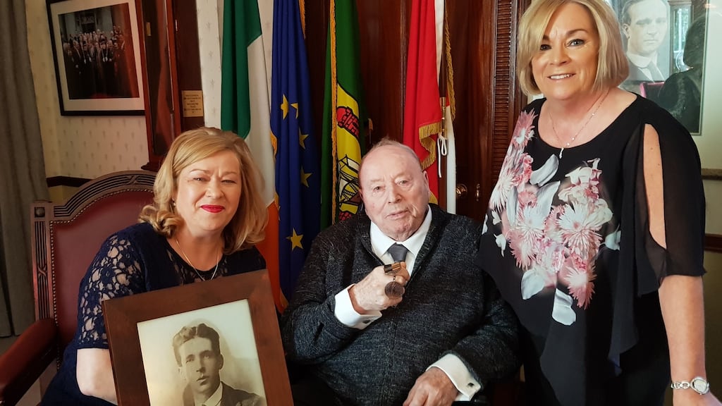 Henry Delaney with family members accepting Service Medal awarded posthumously to his uncle Irish Volunteer Joe Murphy.
