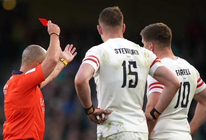 Referee Jaco Peyper sends off England's Freddie Steward for catching Hugh Keenan's head with his elbow at the Aviva Stadium. Photograph: BrianLawless/PA Wire