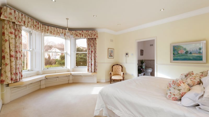 Main bedroom with bay window and en suite bathroom