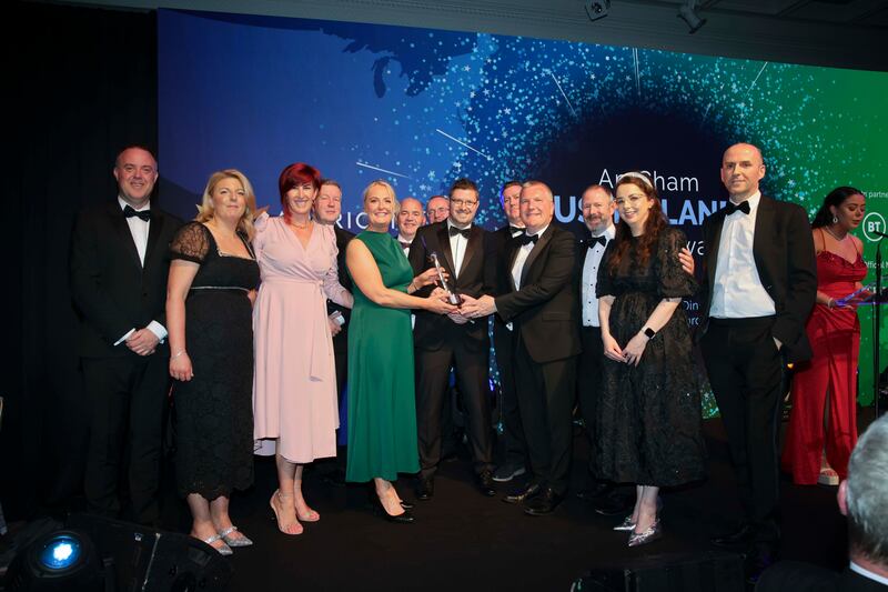 AmCham President, Elaine Murphy and outgoing Minister for Finance, Michael McGrath, presenting the American Chamber 2024 global impact award to Intel Ireland for its Fab 34 manufacturing facility at the 2024 US-Ireland Business Awards and Annual Dinner. Photograph: Chris Bellew/Fennell Photography