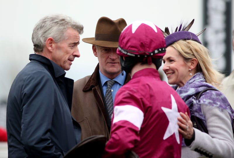 Owner Michael O'Leary, his wife Anita, jockey Bryan Cooper and trainer Willie Mullins after winning the RSA Steeple Chase in Cheltenham with Don Poli in March 2015. Photograph: Dan Sheridan/Inpho