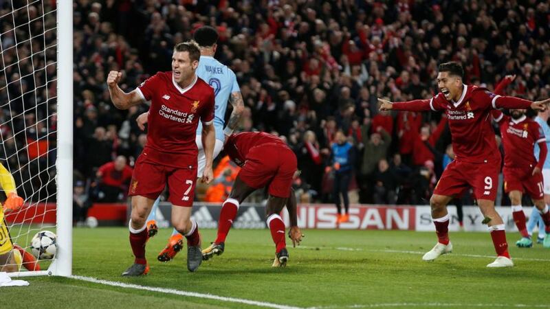 James Milner celebrates Liverpool’s third goal against Manchester City at Anfield. Photograph: Andrew Yates/Reuters