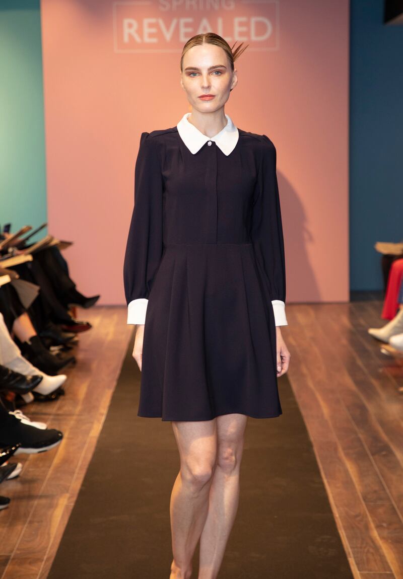 Sarah wears: Navy dress, Tara Jarmon, €270, Shoes by Kurt Geiger, €145