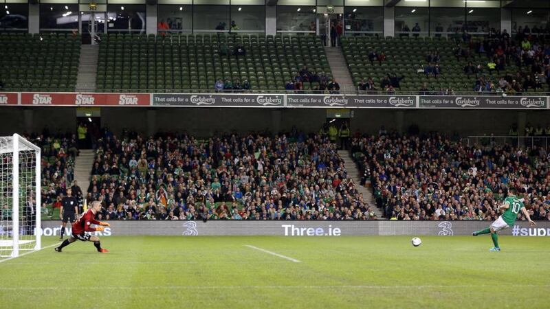 Ireland’s Robbie Keane scores a penalty past Kazakhstan goalkeeper Andrey Sidelnikov. Photograph: Cathal Noonan/Inpho