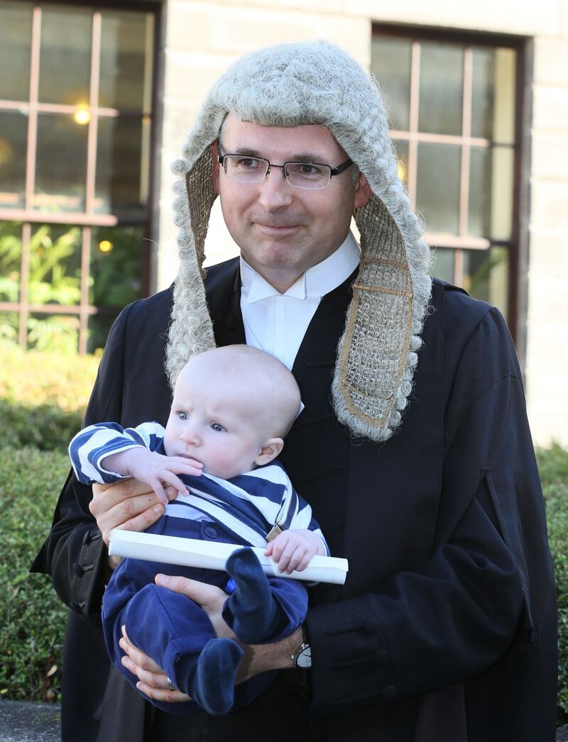 The late Paul Anthony McDermott SC pictured with his son, Harry (4months old) following a ceremony in the Supreme Court where he was called to the inner bar in 2015. Photograph: Collins Courts