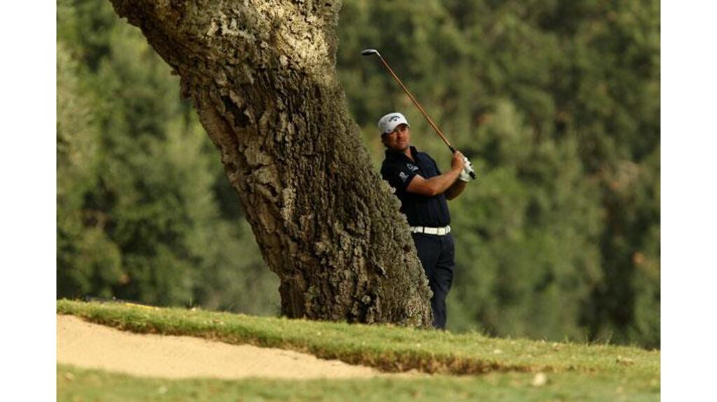 Graeme McDowell plays into the seventh green during the first round of the Andalucia Valderrama Masters at in Sotogrande, Spain. (Photograph: Richard Heathcote/Getty Images)