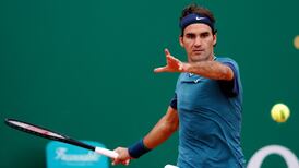 Federer cruises into third round in Monaco