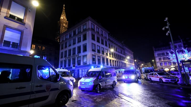 Rescue vehicles are parked near the Christmas market where a deadly shooting took place in Strasbourg, France, 12th December 2018. Photograph: Patrick Seeger/EPA