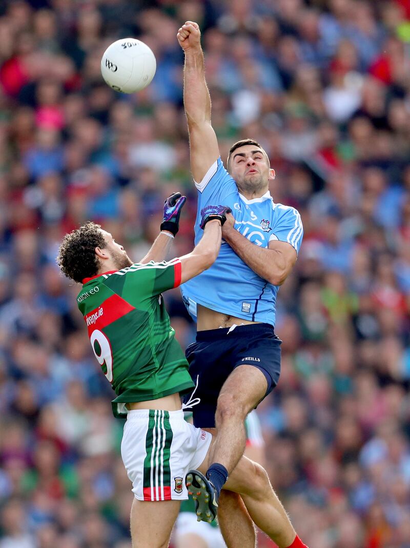 James McCarthy rises high above Mayo's Tom Parsons in the 2017 All-Ireland final. Photograph: James Crombie/Inpho