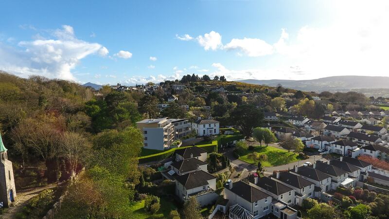 A computer-generated image of the 15-unit apartment scheme within the grounds of Mount Auburn House
