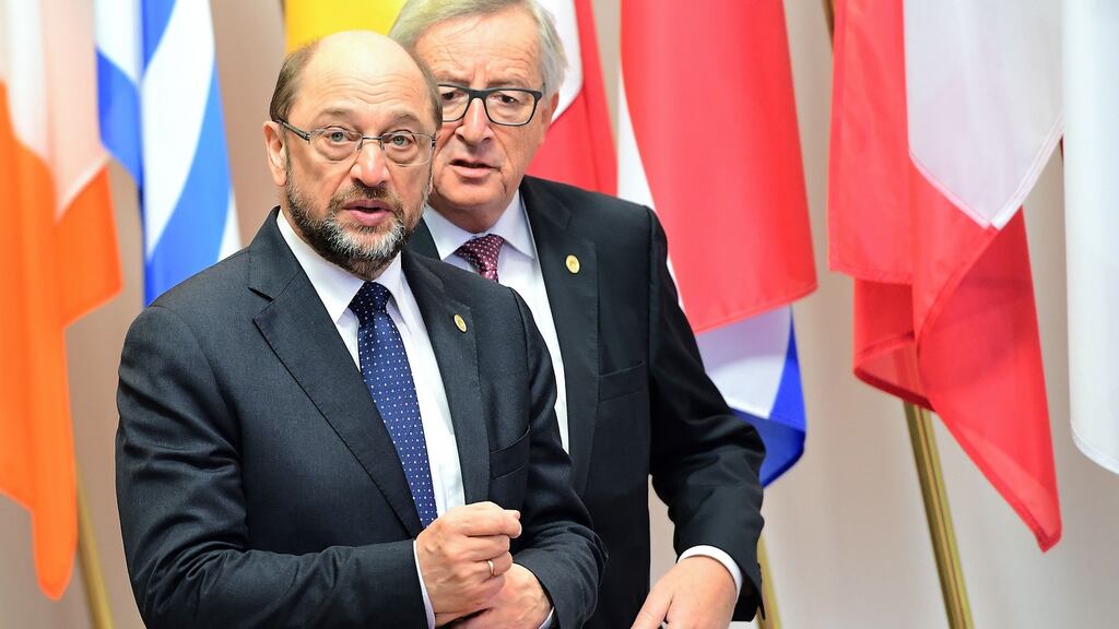 European Parliament president Martin Schulz (left) and European Commission president Jean-Claude Juncker prepare to greet the president of Ukraine Petro Poroshenko in Brussels on Thursday. Photograph: Emmanuel Dunand/AFP