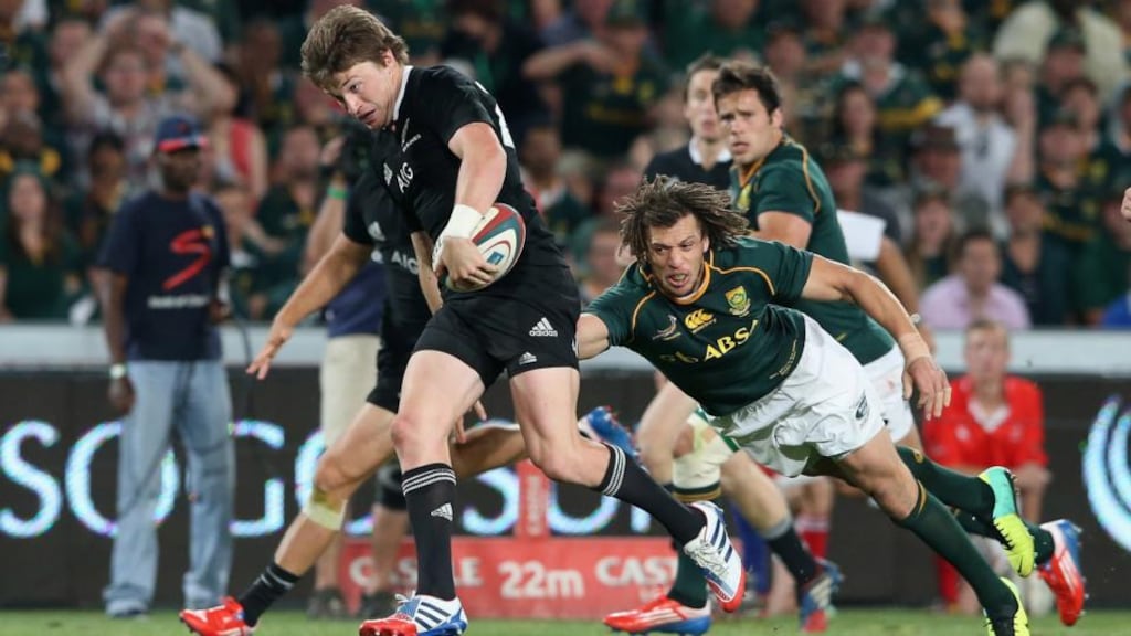 New Zealand’s Beauden Barrett gets through the tackle of South Africa fullback Zane Kirchner to score the bonus point winning fourth try during the Rugby Championship match at Ellis Park in Johannesburg. Photograph: David Rogers/Getty Images