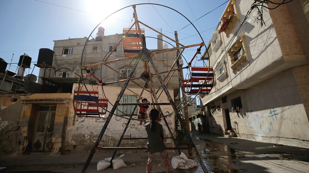 Palestinian children play in the southern Gaza Strip. Photograph: Mohammed Saber/EPA