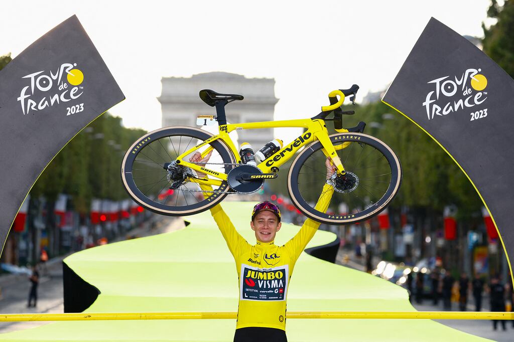 Jumbo-Visma's Danish rider Jonas Vingegaard celebrates winning his second Tour de France title, at the Champs-Elysees in Paris on Sunday. Photograph: Etienne Garnier/POOL/AFP