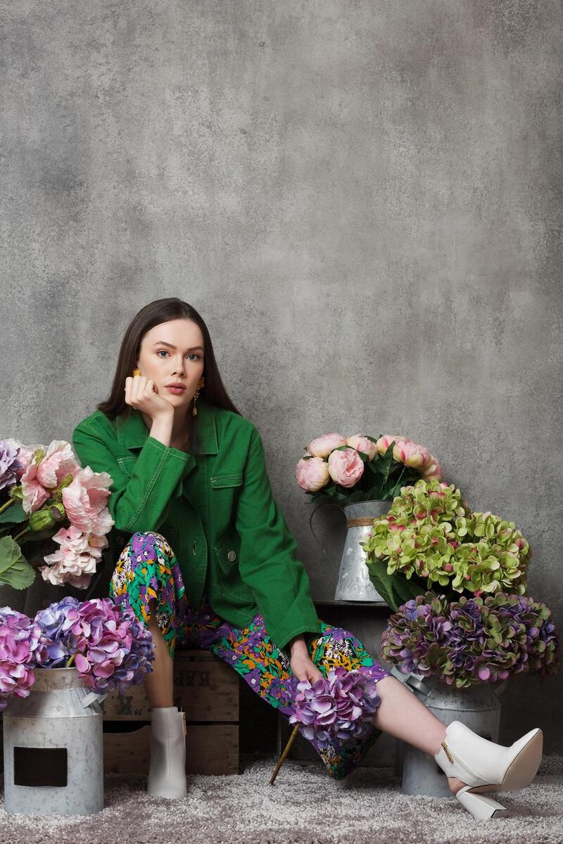 Green jacket €169, jumpsuit €429 Whistles Brown Thomas, boots €80, River Island, earrings €28 Om Diva.