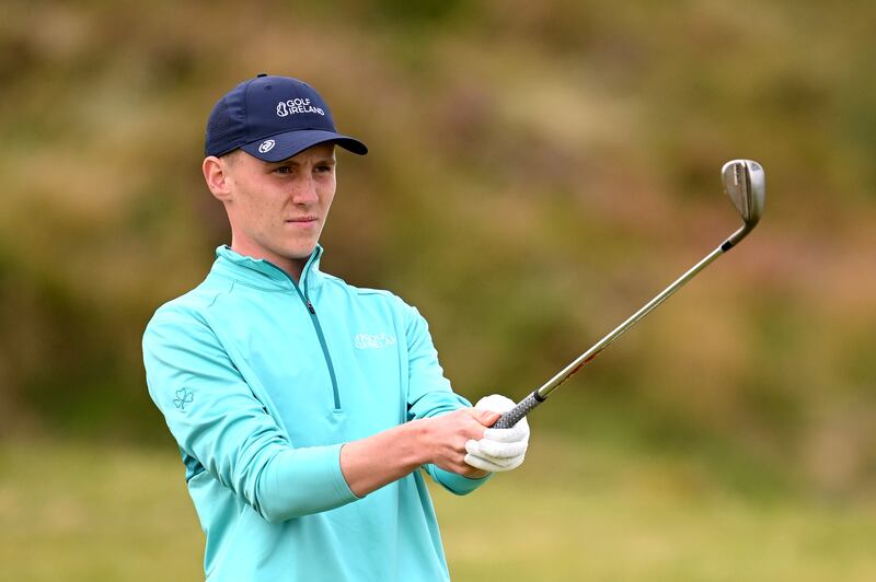17-year-old Irish amateur Seán Keeling lines up his shot on second hole during day two. Photograph: Ross Kinnaird/Getty Images