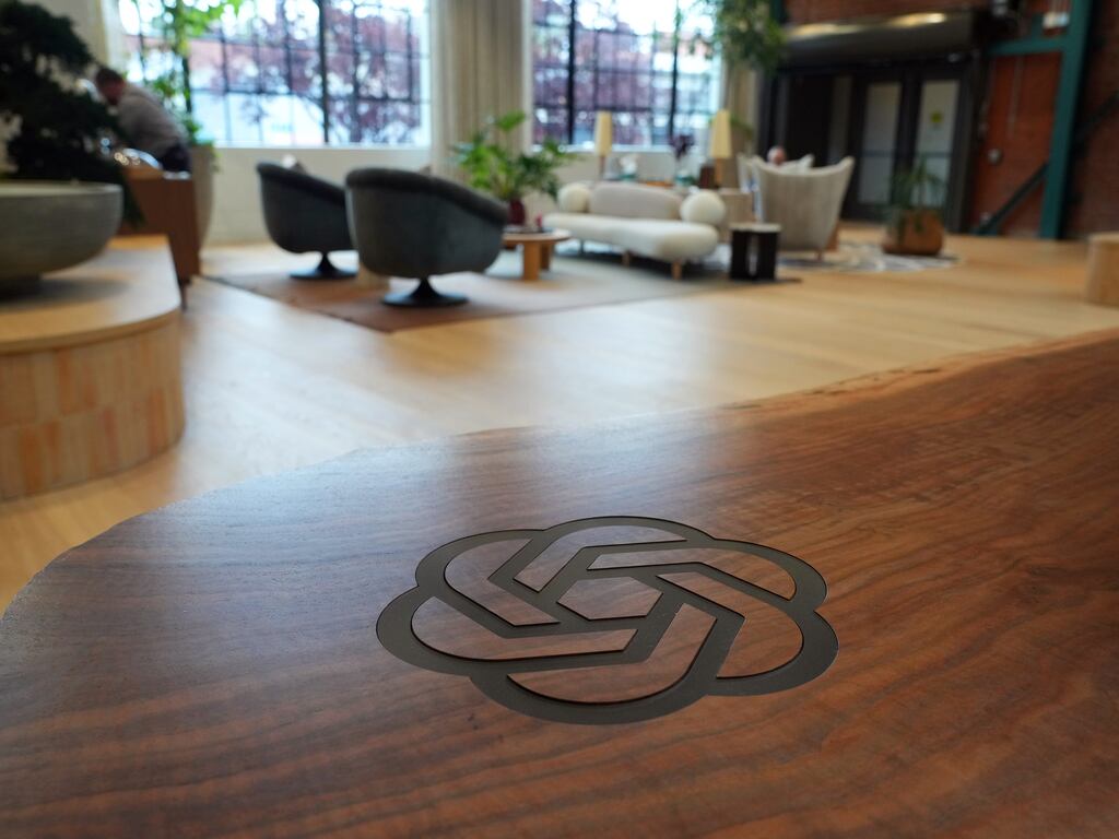 The OpenAI logo appears on a reception desk at the company's San Francisco headquarters. Photograph: Jim Wilson/The New York Times