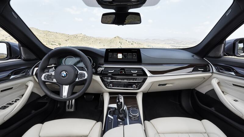 New BMW 5-Series boasts a new high-resolution 10.25-inch in-dash multimedia screen with freshly designed tiles to scroll through to manage the car.