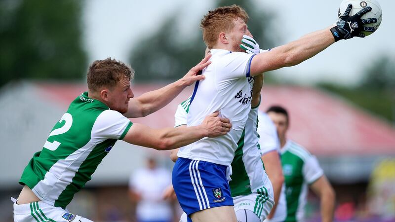 Fermanagh’s Aidan Breen tackles Monaghan’s Kieran Hughes during the Ulster semi-final at Healy Park, Omagh. Photograph: Tommy Dickson/Inpho