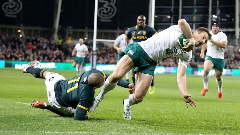 Tommy Bowe scores Ireland’s second try as he avoids South Africa’s Bryan Habana to touch down atbthe Aviva Stadium. Photograph: Dan Sheridan/Inpho
