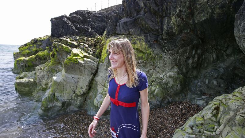 Ruth Fitzmaurice looking for sea pottery at the cove in Greystones. Photograph: Nick Bradshaw