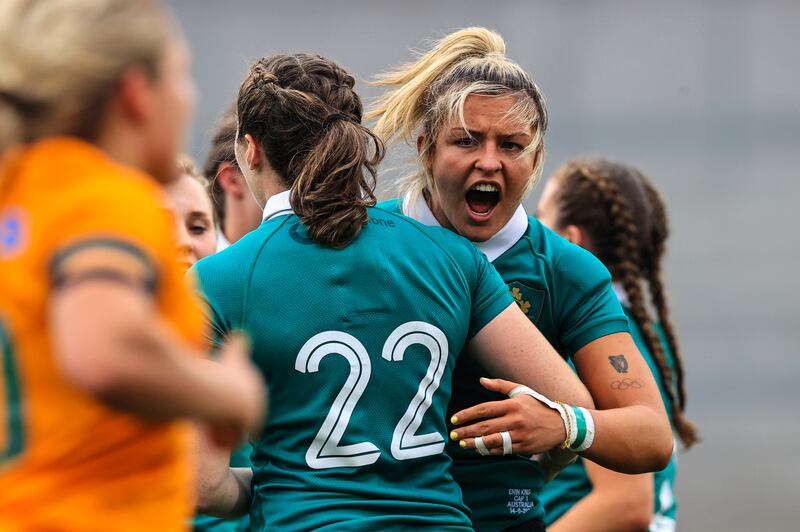 Erin King celebrates with Eve Higgins after Ireland's win over Australia. Photograph: Billy Stickland/Inpho