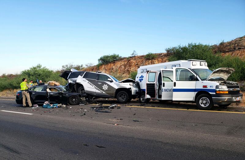 Tesla crash: A Model S rear-ended a police jeep at the scene of an earlier crash in Arizona in July 2020. Photograph: Arizona Department of Public Safety/New York Times