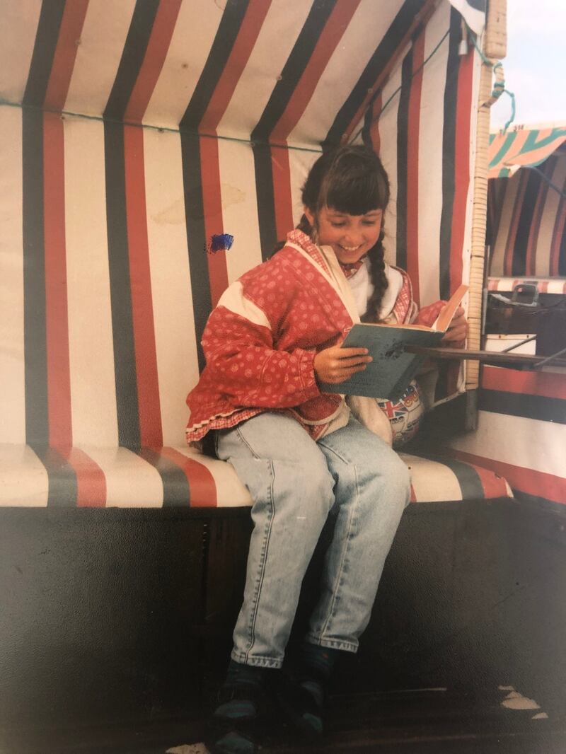 A family photograph of Sophie as a child