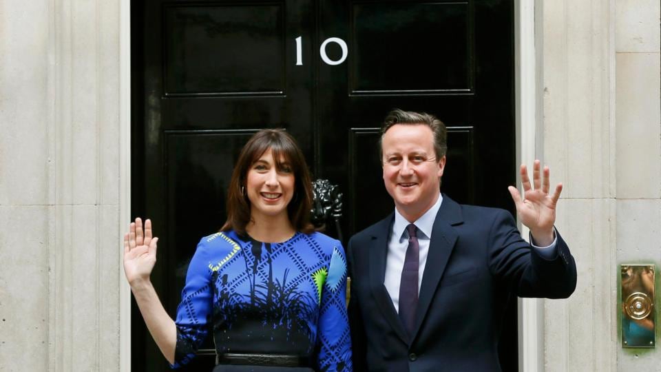 Britain’s prime minister David Cameron and his wife Samantha wave as they return to Number 10 Downing Street after meeting with Queen Elizabeth at Buckingham Palace in London on Friday. Photograph: Stefan Wermuth/Reuters