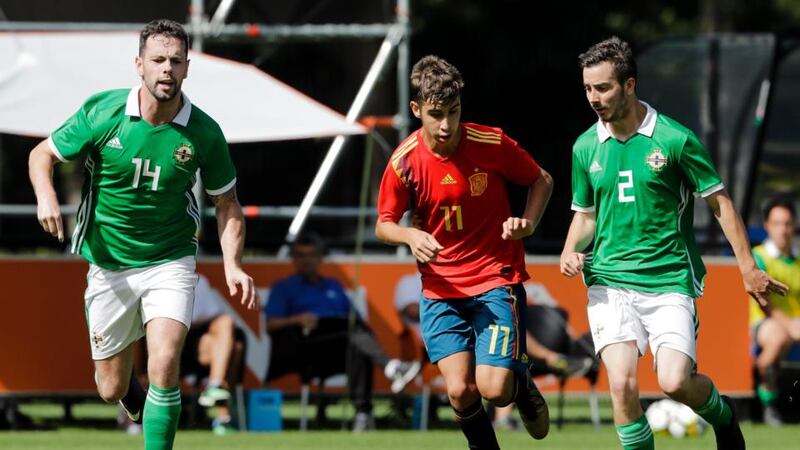 Shea Tighe of Northern Ireland, Diego Barreto of Spain and Charlie Fogarty of Northern Ireland during a recent CP match in Holland. Photo: Eric Verhoeven/Soccrates/Getty Images