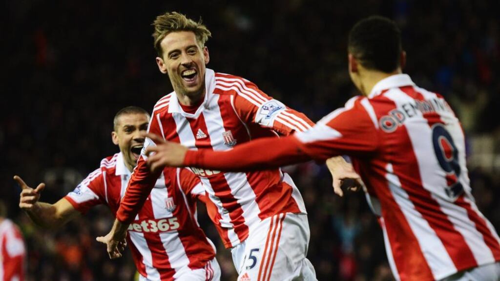Peter Crouch of Stoke City celebrates after scoring against Swansea City at the Britannia Stadium last night. Photograph: Jamie McDonald/Getty Images