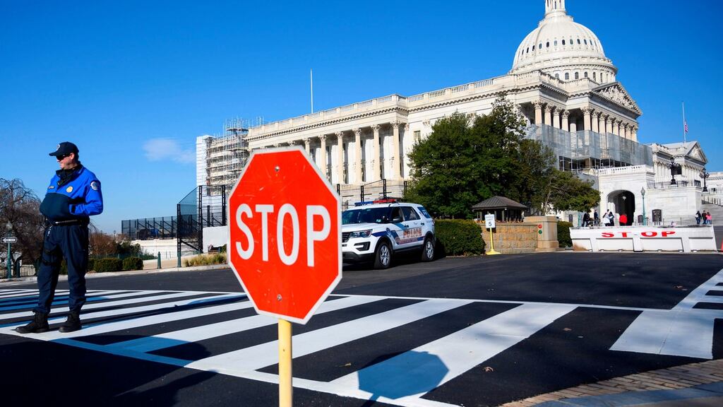 A police officer stands near the US Capitol during a government shutdown. Photograph: Andrew Caballero-Reynolds/AFP/Getty Images