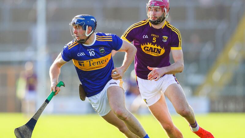 Jason Forde in action against Wexford’s Paudie Foley at Wexford Park. Photograph:  Tommy Dickson/Inpho