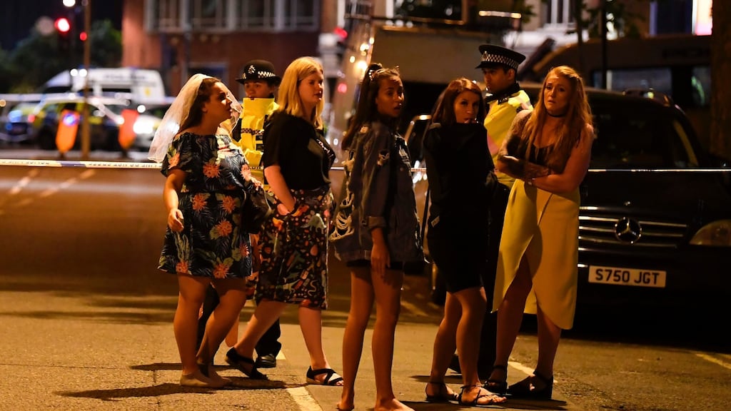Women stand at a police cordon set up in London following the terrorist attacks on London Bridge and Borough Market.   Photograph: Justin Tallis/AFP/Getty Images