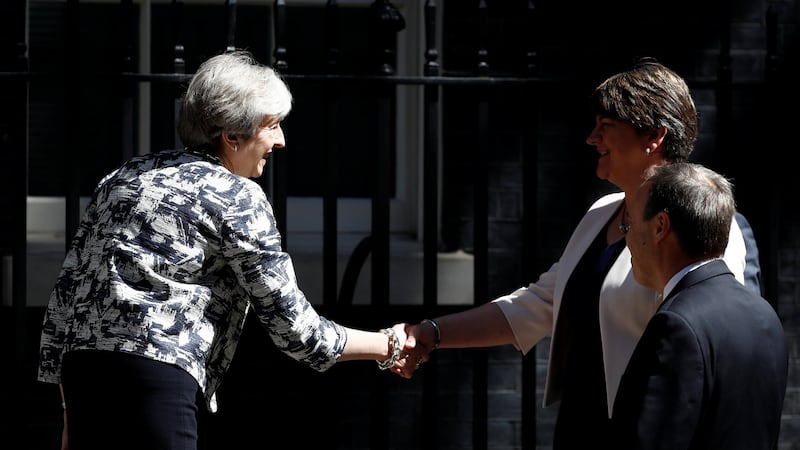 British prime minister Theresa May, shakes hands with DUP leader Arlene Foster outside 10 Downing Street ahead of talks . Photograph: Stefan Wermuth/Reuters