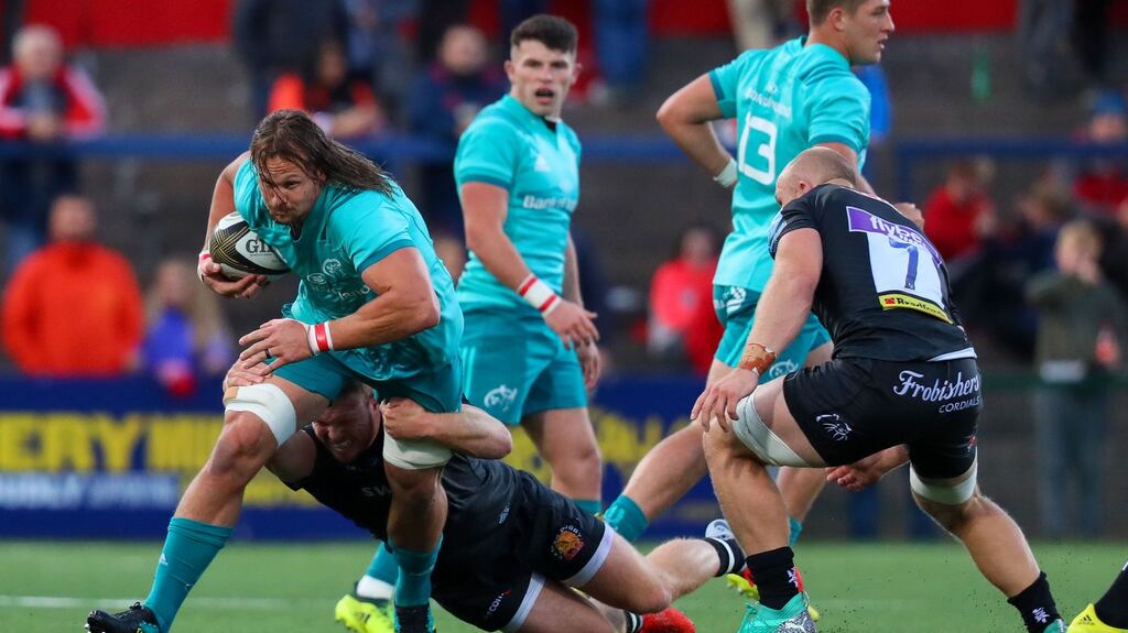 Munster’s Arno Botha is tackled by Sam Simmonds. Photograph: Tommy Dickson/Inpho