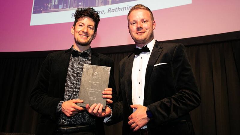 Gerard de Brún, Commercial Director, Fiontar Safety Management presents the Building of the Year – Retail Award to Peter LeMasney, Plus Architecture.