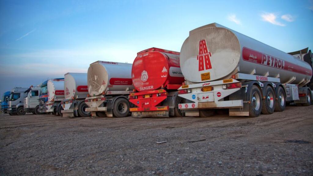 Oil tank trucks in Erbil, Iraq. A worker wounded in today’s assault said the attackers sped up in three cars as he and his colleagues were digging a trench to extend a pipeline. Photograph: Khaled Hasan/The New York Times