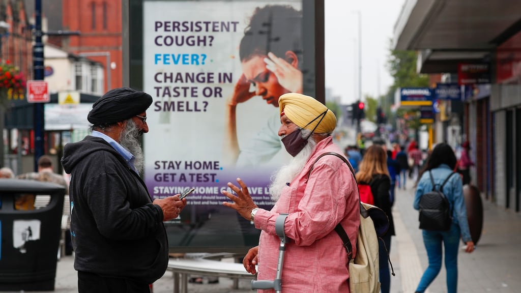 Locals in West Bromwich on Thursday. New modelling by University College London’s Karl Friston suggests that Britain has only two or three weeks to improve contact tracing before the virus spreads out of control. Photograph: Darren Staples/Bloomberg
