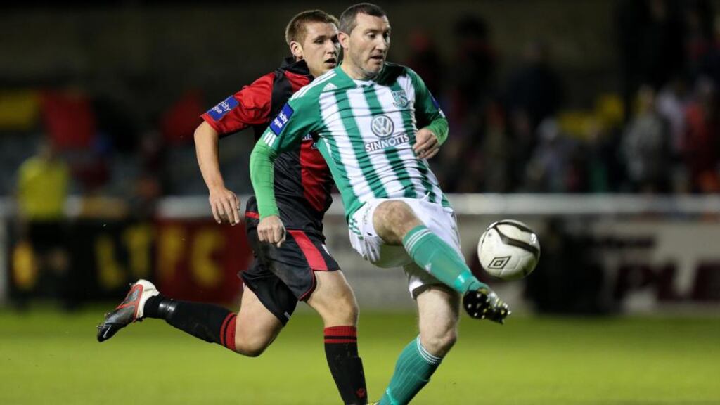 Bray’s Jason Byrne lobs the keeper for his side’s second goal. Photograph: James Crombie/Inpho