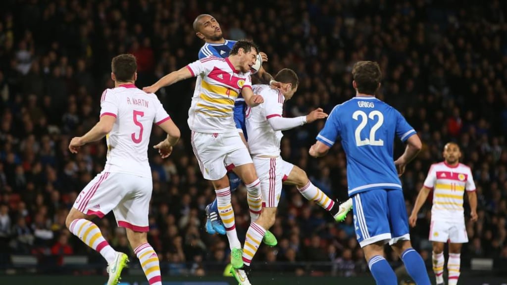 Gordon Greer wins a header against Northern Ireland’s Josh Magennis at Hampden Park. Photograph: Ian MacNicol/AFP/Getty Images