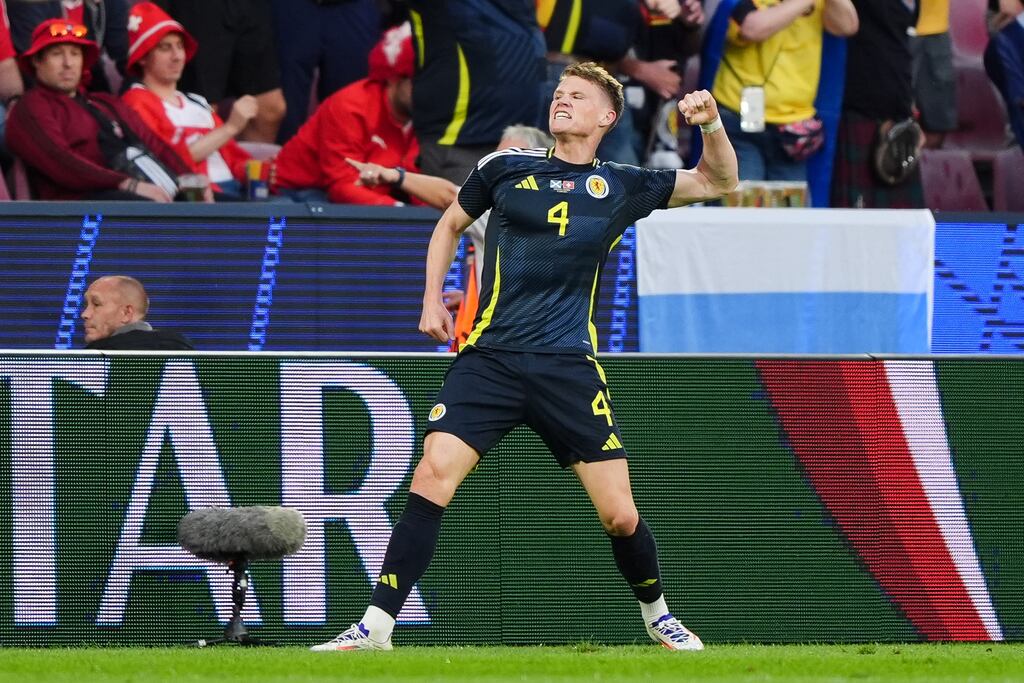 Scotland's Scott McTominay celebrates after scoring the opening goal of the game. Photograph: Andrew Milligan/PA Wire