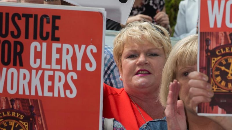 Liz Meade, who would have been with Clerys for 22 years this September, with other former staff protesting outside the offices of new owners Natrium on Harcourt Terrace on Friday. Photograph: Fergal Phillips