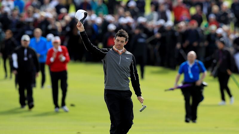 Rory McIlroy salutes the crowd as he makes his way to the 18th green to complete his victory  at the  2016 Dubai Duty Free Irish Open. Photograph: Donall Farmer/Inpho