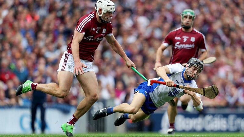 Gearoid McInerney is tackled by Jamie Barron of Waterford during the All-Ireland final. Photo: Tommy Dickson/Inpho